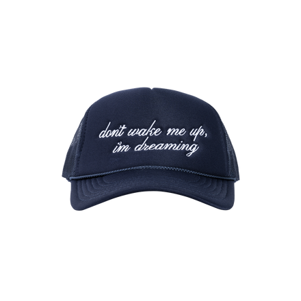 IM DREAMING TRUCKER HAT (FRONT VIEW) the meaning behind this hat is that you are exactly where you need to be and are living the life you always dreamt of. so don't wake up... enjoy this dream life that you worked so hard for and enjoy every present moment  high-profile trucker hat navy 5-panel, snap-back 100% polyester foam front; embroidered in south central, los angeles