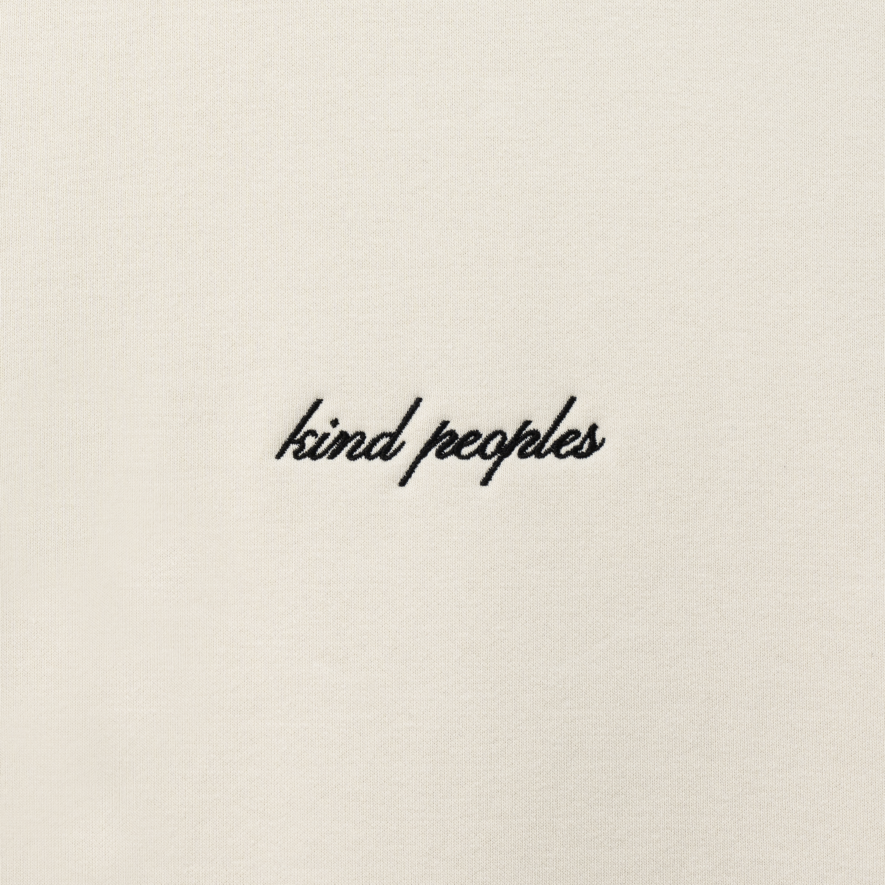 KP SIGNATURE LOGO CREW SWEATSHIRT (DETAIL) signature embroidered "kind Peoples" logo  unisex crew neck sweatshirt cream relaxed fit 80% cotton/ 20% recycled polyester anti-pill fleece | 11.8 oz. embroidered in south central, los angeles